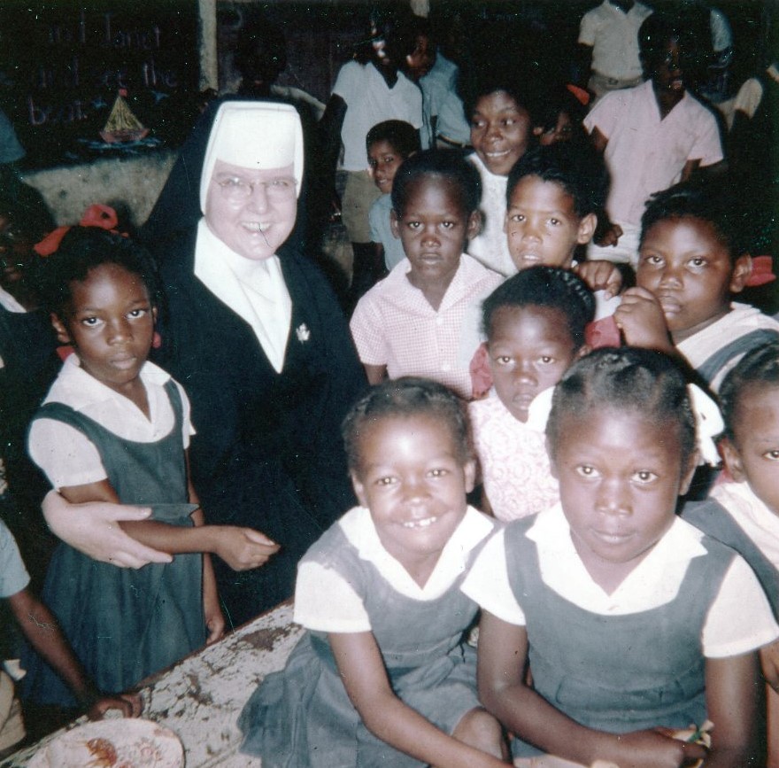 Photo caption: Sister Aloysia Zimmer visiting a school in Trinidad
