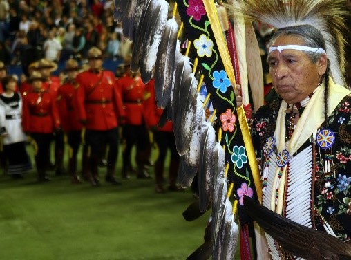 First Nation Indigenous Peoples, man with traditional clothes and headdress