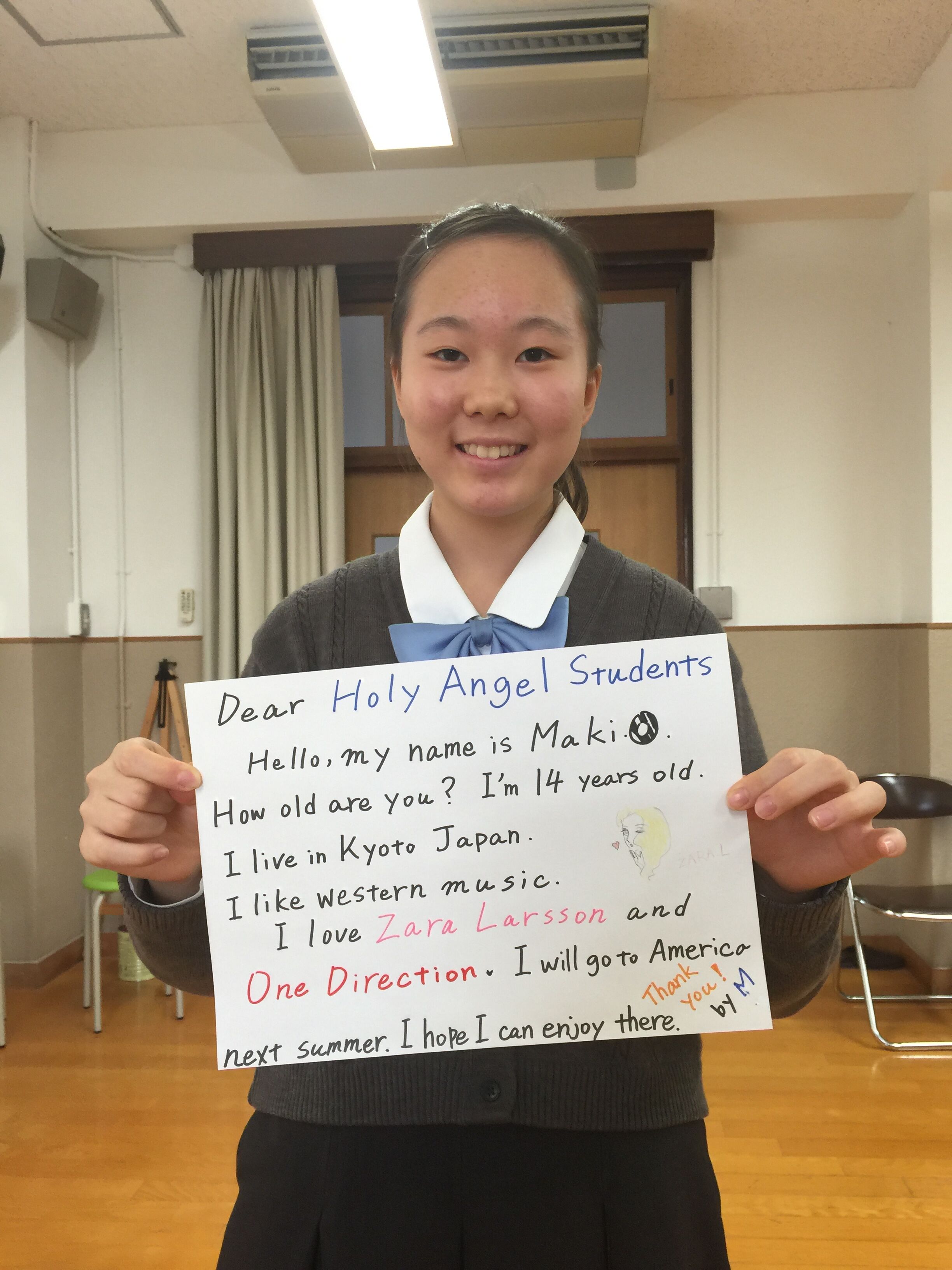 Japanese student Maki asks a question of American students in New Jersey.