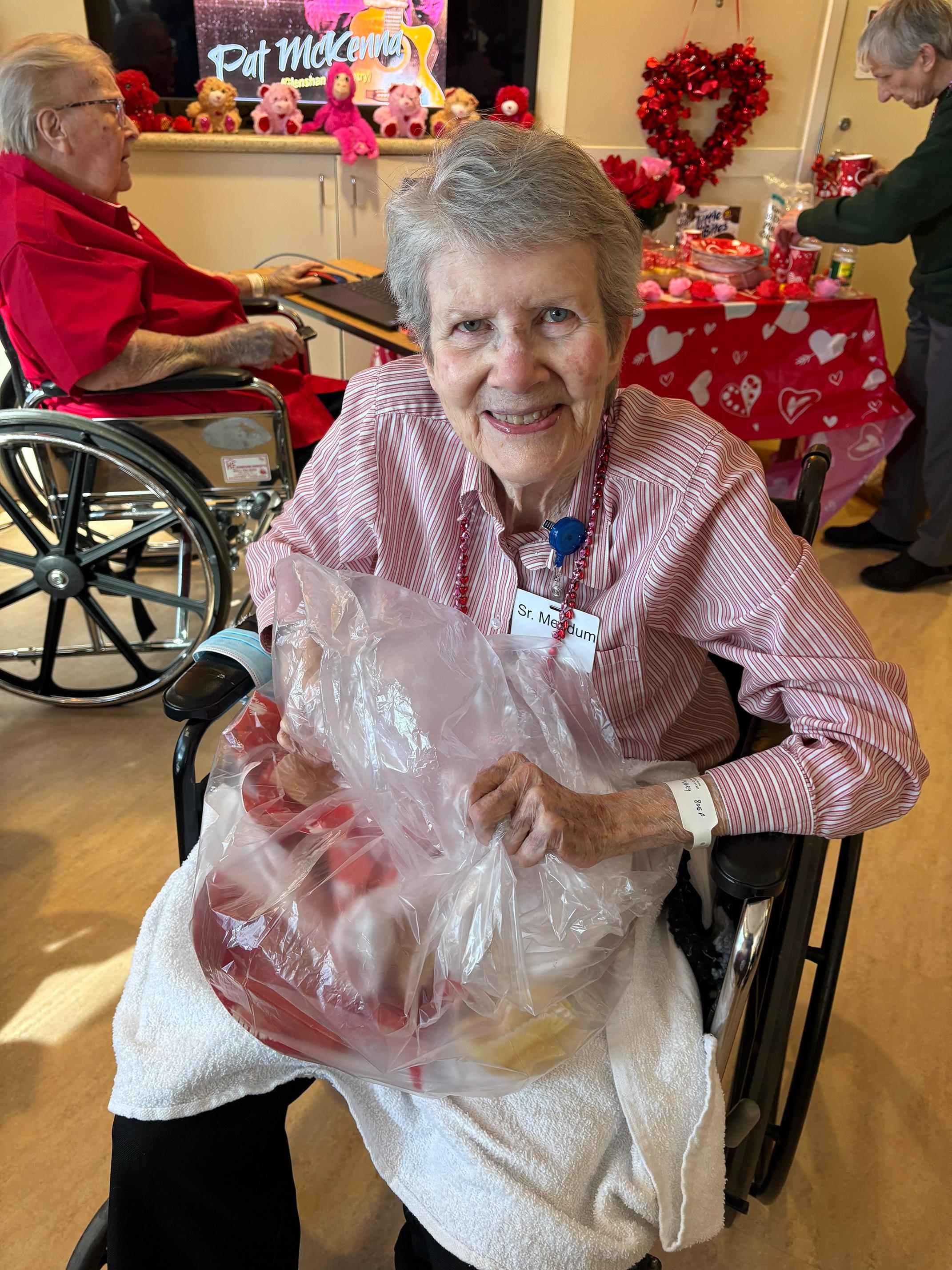 Mary Mendum helping cleaning up. She always volunteers after every party!