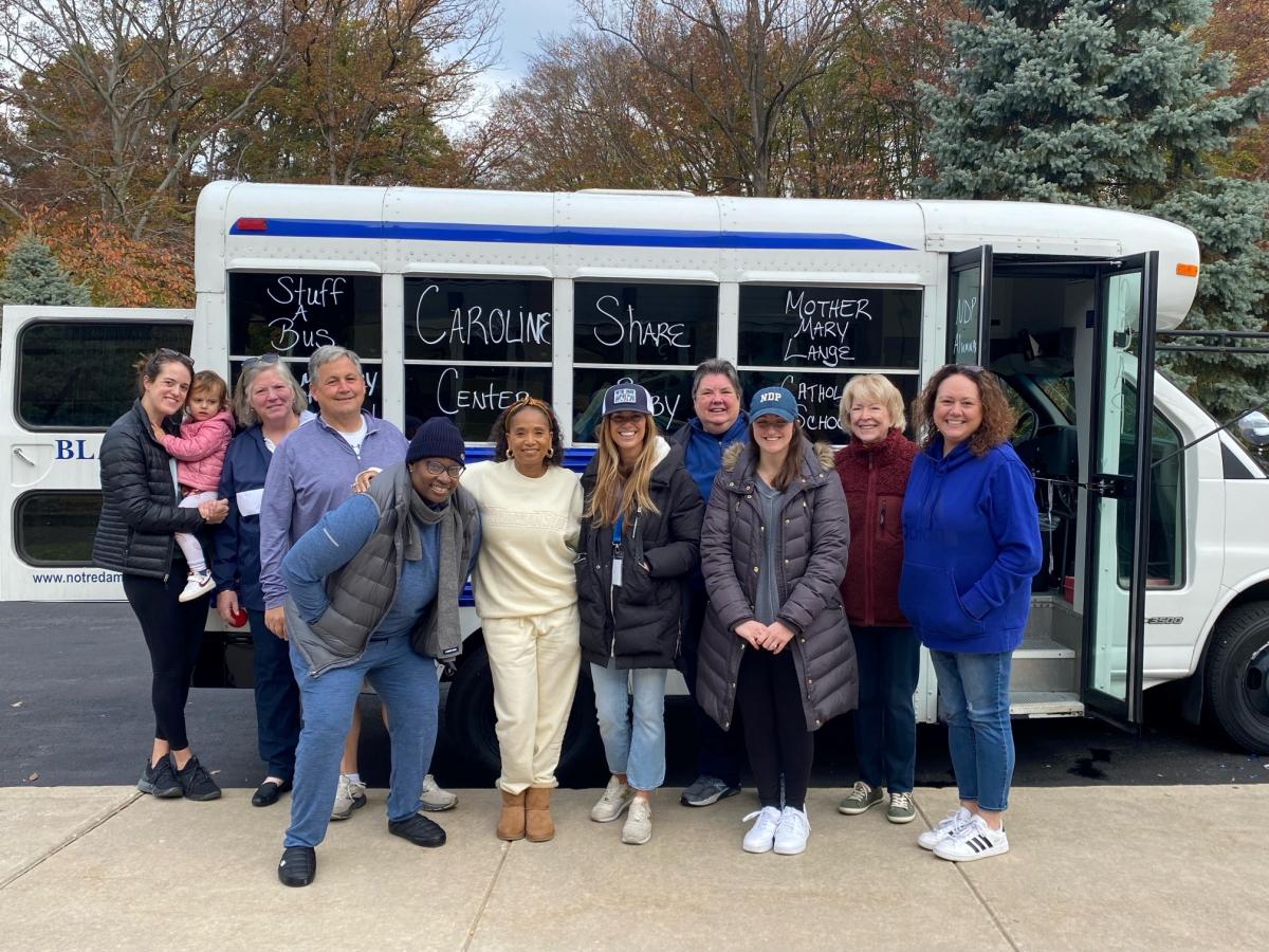 Notre Dame Prep volunteers gather to Stuff A Bus to support Caroline Center, Mother Seton Academy, and Share Baby.