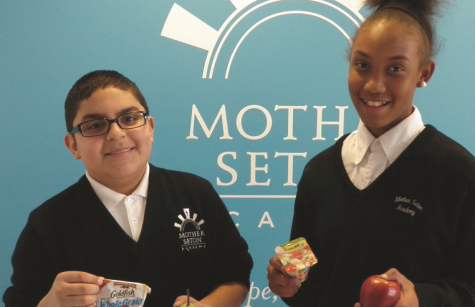 Students eating healthy snacks at Mother Seton Academy