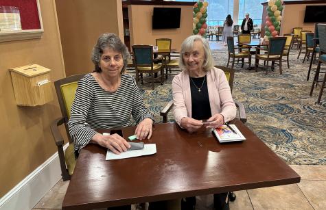 Sisters Karen Kane and Maureen Fleming welcome guests.