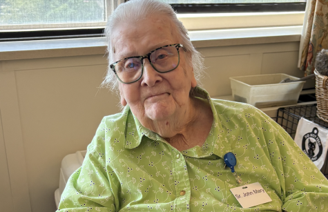 Sister John Mary Hayes enjoys some ice cream cake.