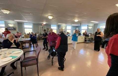 Sisters and staff mob dance.