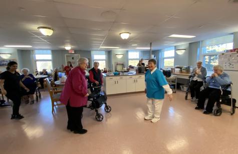 Staff and sisters flash mob dance