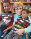 Sister Evelyn with two students from the Notre Dame Learning Center